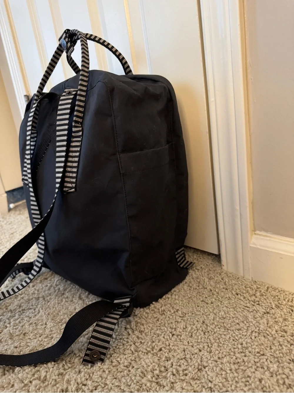 Fjallraven Kanken Backpack in Black with Red Logo